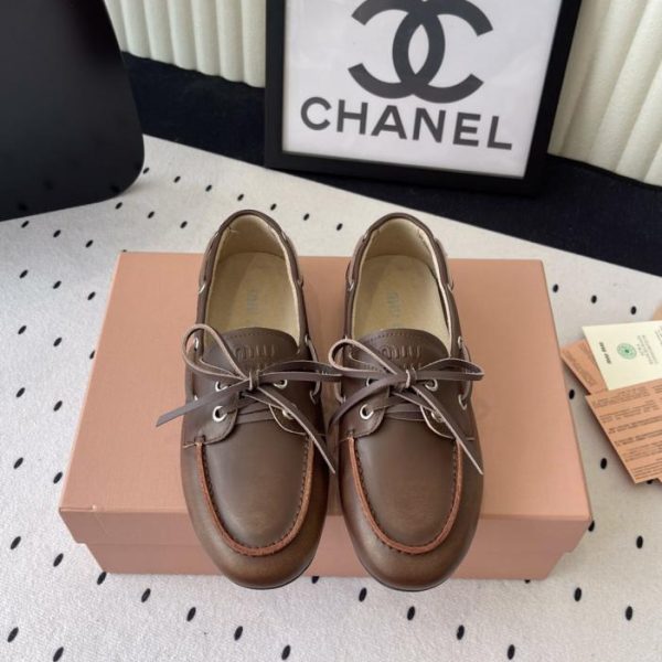 repliche,replica,perfette,siti di,affidabili,migliori siti,dove comprare,1:1,scarpe da ginnastica I nuovi mocassini con fiocco di Miu Miu (7VW7U)