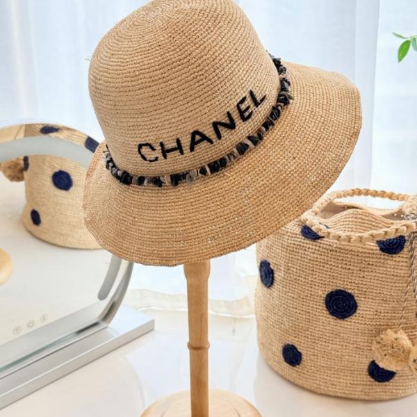 repliche,replica,perfette,siti di,affidabili,migliori siti,dove comprare,1:1,scarpe da ginnastica Cappello da sole Chanel in rafia granulata color ambra (C0YU5T)