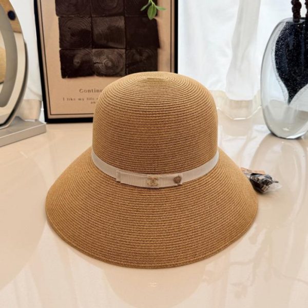 repliche,replica,perfette,siti di,affidabili,migliori siti,dove comprare,1:1,scarpe da ginnastica Cappello da pescatore in paglia Chanel, realizzato in rafia (RVMOQD).