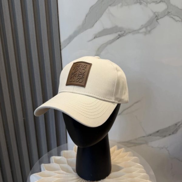 repliche,replica,perfette,siti di,affidabili,migliori siti,dove comprare,1:1,scarpe da ginnastica Nuovo cappellino da baseball dal design originale di Loewe (NXOGIQ)