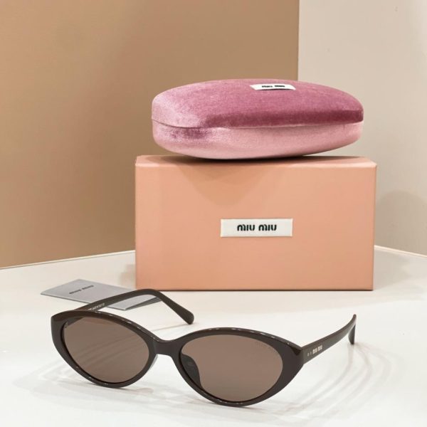 Occhiali da sole MIUMIU MODELLO SMU 60WS (D6MBK2)