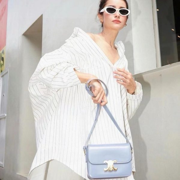 repliche,replica,perfette,siti di,affidabili,migliori siti,dove comprare,1:1,scarpe da ginnastica Occhiali da sole cat-eye Prada, indossati dalle celebrità (0U7VSI)