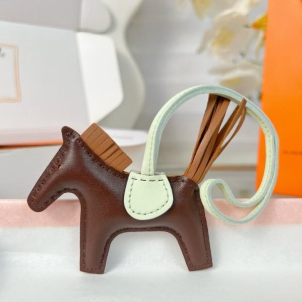 repliche,replica,perfette,siti di,affidabili,migliori siti,dove comprare,1:1,scarpe da ginnastica Portachiavi/ciondolo per borsa HERMES mini pony Rodeo pegase classico, cucito a mano in pelle di agnello (M3M2CG).