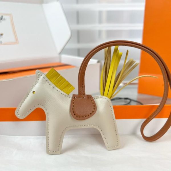 repliche,replica,perfette,siti di,affidabili,migliori siti,dove comprare,1:1,scarpe da ginnastica Portachiavi/ciondolo per borsa HERMES mini pony Rodeo pegase classico, cucito a mano in pelle di agnello (MBS4SD).