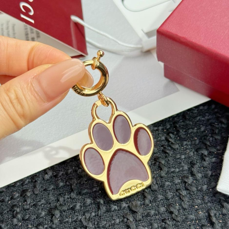 repliche,replica,perfette,siti di,affidabili,migliori siti,dove comprare,1:1,scarpe da ginnastica Nuovo portachiavi Gucci a forma di zampa di cane (4IMIFG)