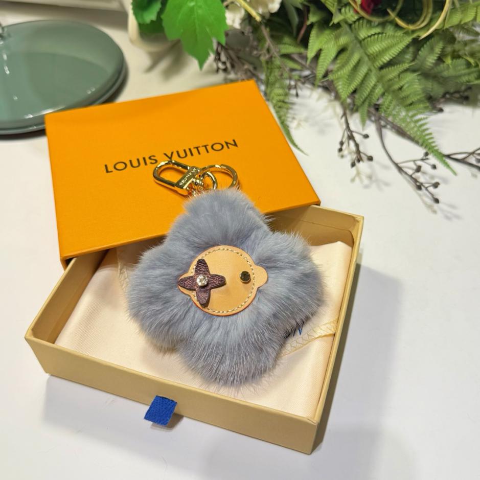 repliche,replica,perfette,siti di,affidabili,migliori siti,dove comprare,1:1,scarpe da ginnastica Portachiavi/ciondolo per borsa LOUIS VUITTON in pelliccia di visone con pompon, nuovo stile VIVIENNE FUR Girasole in peluche con pompon (LN06XD)