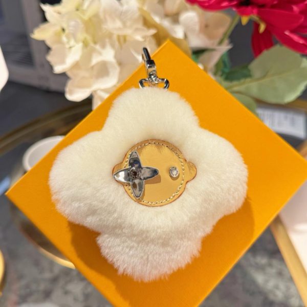 Nuovo arrivo: portachiavi/ciondolo per borsa LOUIS VUITTON VIVIENNE SHEARLING con pompon a forma di girasole (ANU83B)
