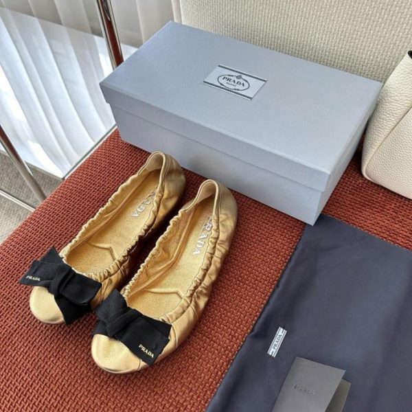 Ballerine Prada Mordore in pelle nappa con fiocco, color oro platino (AW5ZZJ)